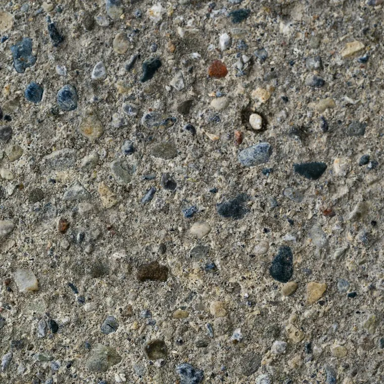 Superficie de hormigón lavado con el árido de colores a la vista